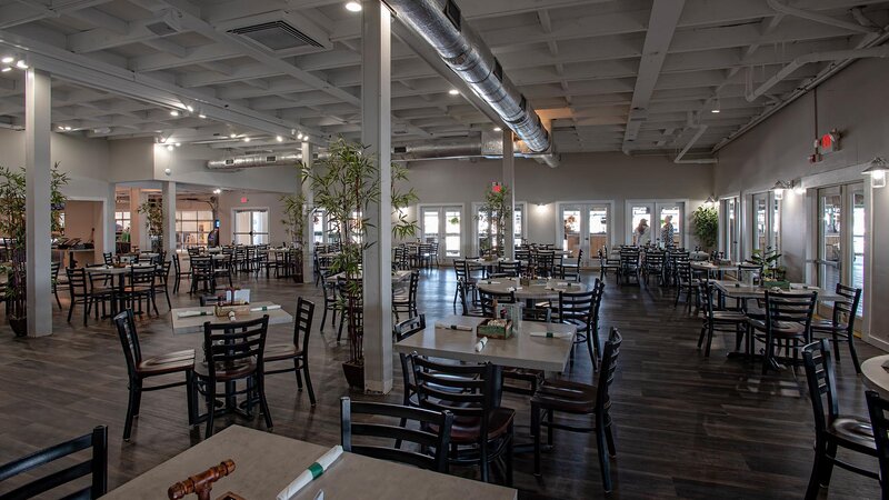 Inside dining area with multiple tables