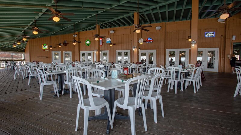Outside dining with multiple set tables