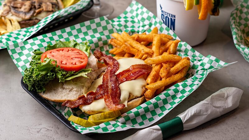 Bacon cheese burger entree with side of french fries